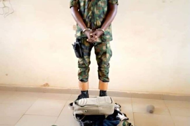 33-YEAR-OLD FAKE NAVY OFFICER NABBED IN DOMA MARKET
