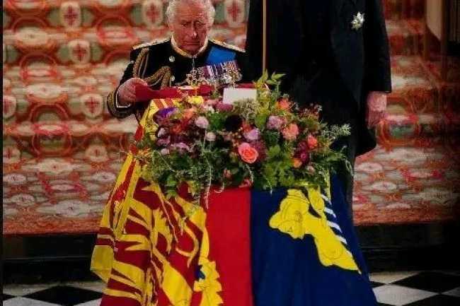 QUEEN'S COFFIN LOWERED INTO ST GEORGE'S CHAPEL VAULT TO LIE BESIDE HER BELOVED PHILIP AND PARENTS