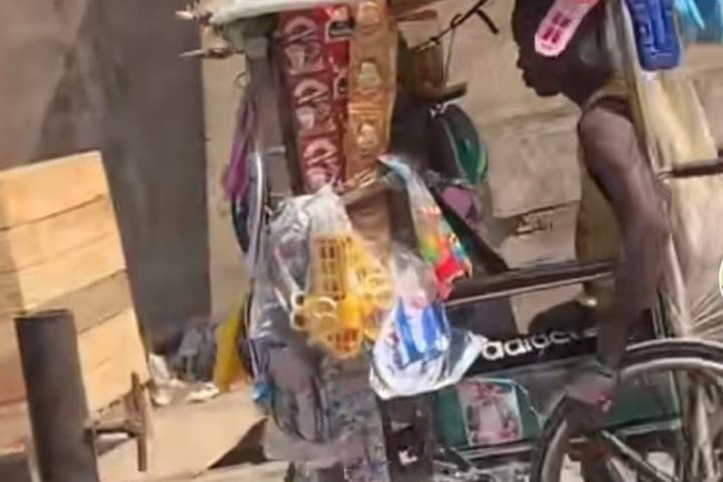 SAD AS DISABLED NIGERIAN MAN CONVERTS WHEELCHAIR TO PROVISION STORE IN VIDEO