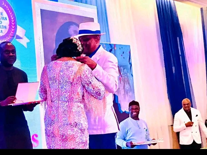 GOVERNOR WIKE GIVES HIS WIFE AN AWARD
