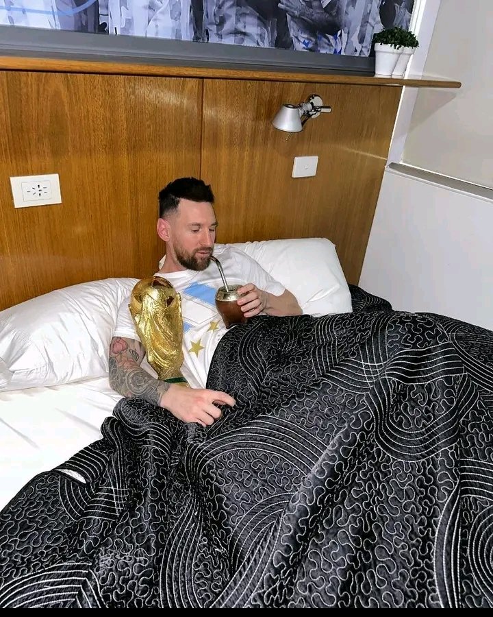 PHOTOS: MESSI IN BED WITH WORLD CUP TROPHY