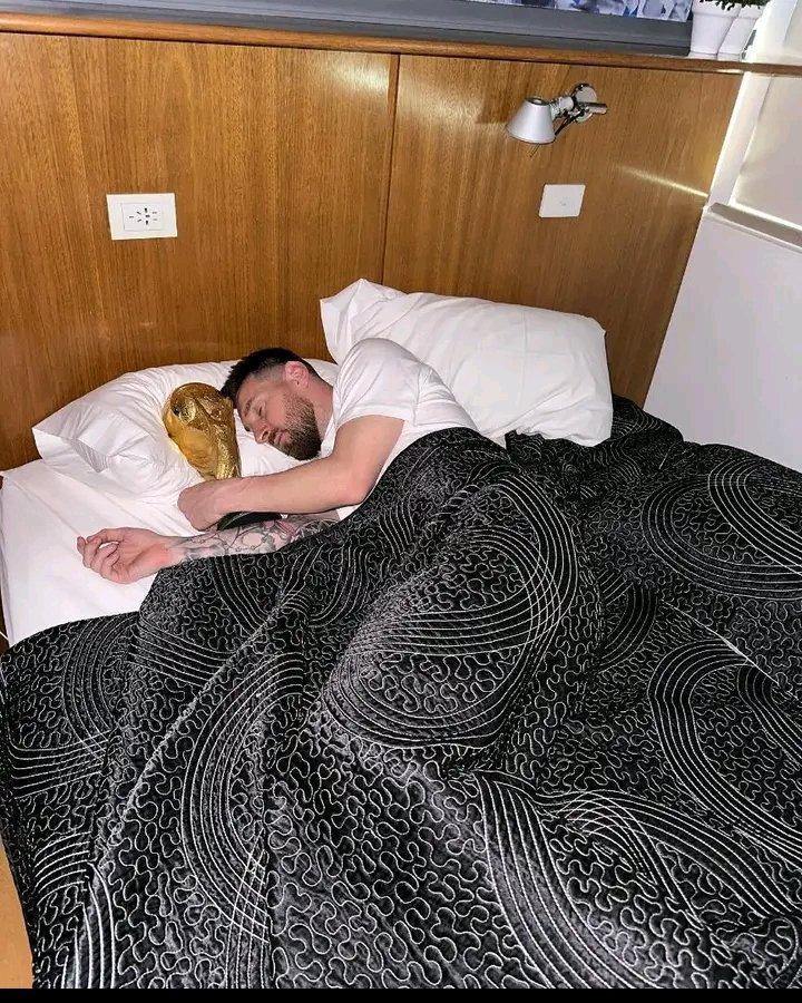 PHOTOS: MESSI IN BED WITH WORLD CUP TROPHY