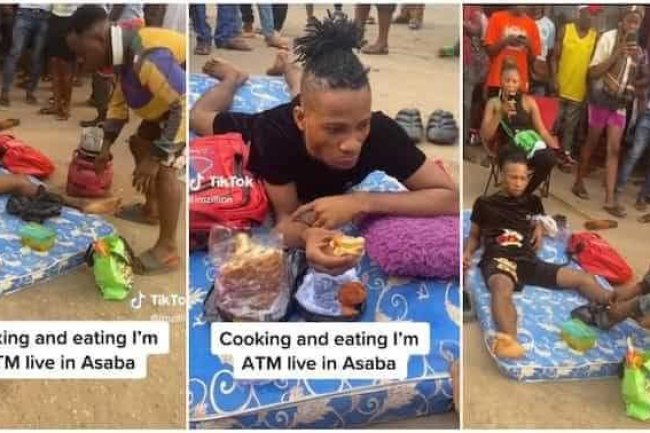 NIGERIAN MAN SHOWS UP AT AN ATM WITH HIS BED, PILLOW, GAS COOKER AND A POT AMIDST NAIRA SCARCITY 