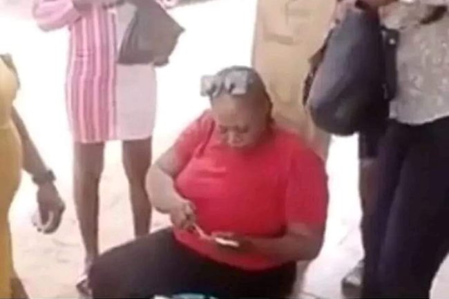POLICE ARREST WOMAN SPOTTED IN VIRAL VIDEO EXTORTING MONEY FROM THOSE COLLECTING THEIR PVC IN ENUGU STATE  