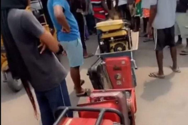 FUEL SCARCITY: NIGERIANS QUEUE AT FILLING STATION WITH GENERATORS