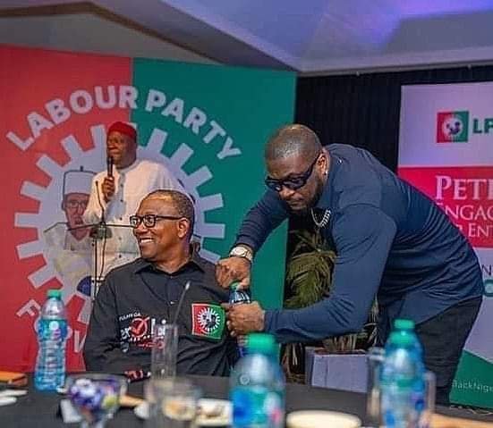 "I AM OBIDIENT AND YUSFUL," PETER OKOYE SAYS AS HE HANDS PETER OBI A BOTTLE OF WATER