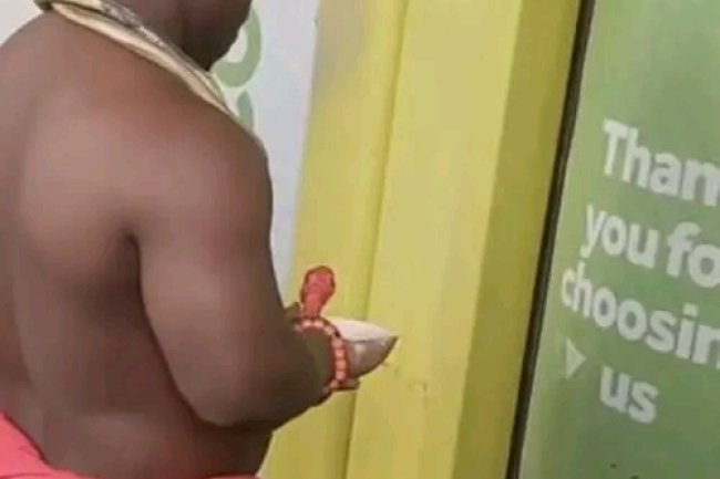 PHOTOS: NATIVE DOCTOR STORMS BANK