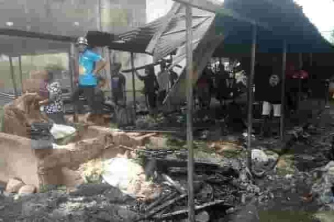PHOTOS: FIRE GUTS RIVERS OIL MILL MARKET