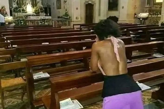 IN THE CHURCH!!! WITH THIS TYPE OF DRESS, DO YOU THINK GOD WILL ANSWER HER PRAYERS?