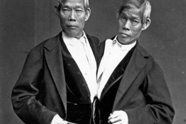 CHANG BUNKER AND ENG BUNKER, THE CONJOINED TWIN BROTHERS KNOWN AS THE SIAMESE TWINS