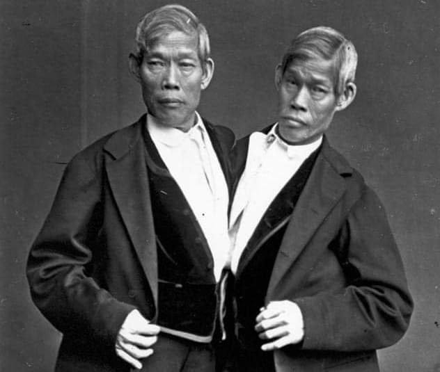 CHANG BUNKER AND ENG BUNKER, THE CONJOINED TWIN BROTHERS KNOWN AS THE SIAMESE TWINS